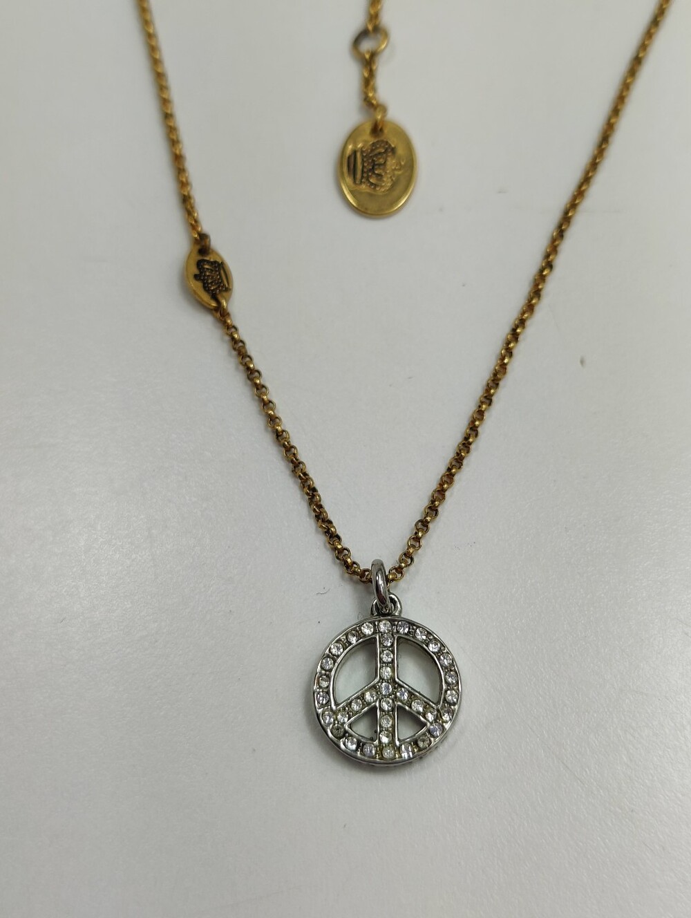 Juicy Couture Peace Sign Necklace Gold Tone Chain Silver Tone Rhinestone Pendant